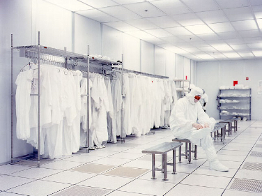 image of room containing sterile gowns for scientists