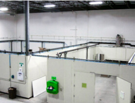 wall partitions for a laser enclosure