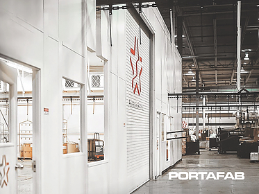 demising walls enclosing powder coating process